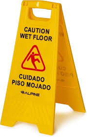 שלט אזהרה "זהירות רצפה רטובה בעברית